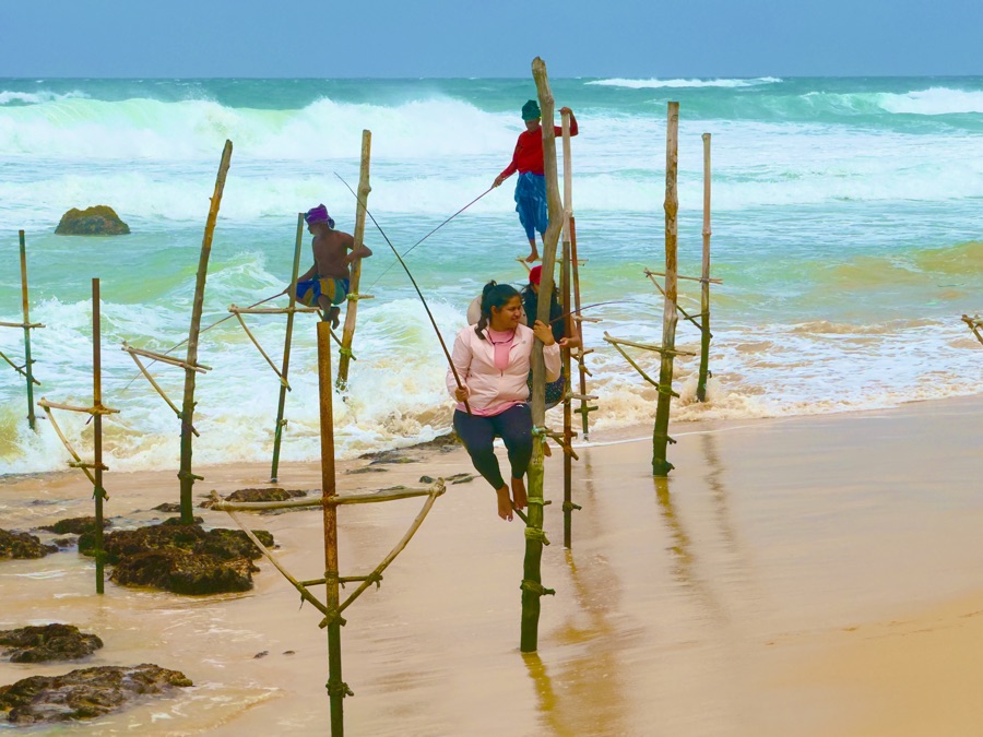 Pristine sandy shoreline stretching along the warm southern Sri Lankan coast